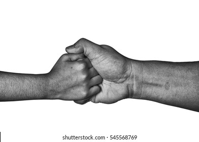 adult and kid hands hold each other fingers firmly in black and white isolated on white. - Shutterstock ID 545568769