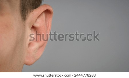 Similar – Image, Stock Photo Close-up of a male receiving a detailed neck massage from a therapist. Wellness Hotel Concept image.