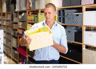 Adult Man Client Choosing Storage Basket At Store Of Household Goods