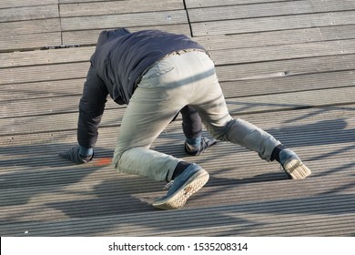 Adult Man Crawling On The Ground