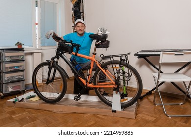 Adult Man Dusting Dirt Off His Sport Bike Before New Season