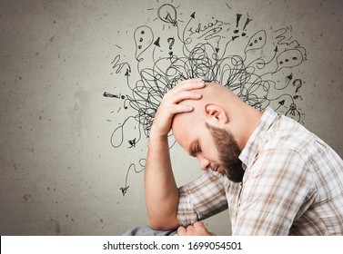 Adult man feels stress and anxiety with drawing illustrations - Shutterstock ID 1699054501