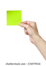 adult man hand holding green sticky note, isolated on white