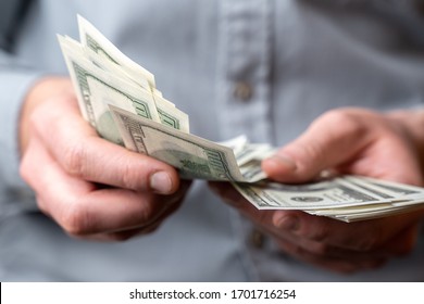 Adult man hands count money dollars