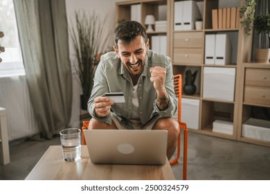 adult man have online shopping on laptop with credit card - Powered by Shutterstock