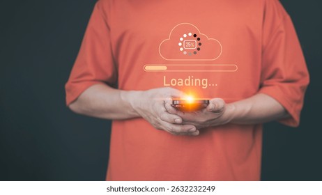 Adult man holding a smartphone with a glowing orange cloud upload icon and loading progress bar, representing cloud computing, data transfer, internet of things, and digital technology.