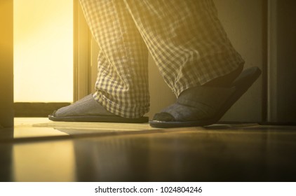 Adult Man In Pajamas Walks To A Bathroom At The Night. Men's Healths Concept. Toned.