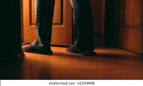 Adult Man Walks To A Bathroom At The Night 