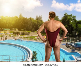 Adult Man In Woman's Bathing Suit