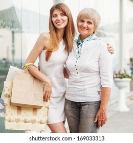 Adult Mother And Daughter After Shopping 