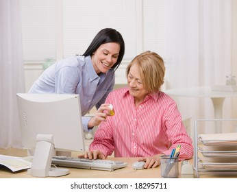 Adult Mother And Daughter Ordering Prescription Medication Online At Home