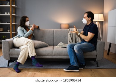 Adult People Learning Deaf Sign Language In Face Mask