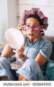 Adult Pretty Caucasian Woman Checking Wrinkled Near Eye - Concept Of Aging And Time - Blepharoplasty And Eyelid Surgery - People At Home With Mirror And Make Up - Pink Colors And Glasses Beauty Female