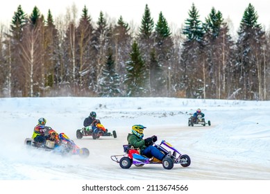 Adult Ride A Racing Cart On The Track In Winter. Karting School For Adults, Training Men To Drive A Car. Driving School. 