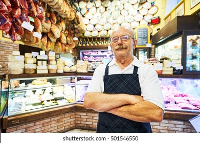 Adult Seller Portrait In Butcher Store