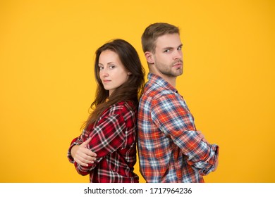 Adult Siblings. Sister And Brother. Confident Team. Back To Back Standing Man And Woman. Fashion Clothes Shop. Modern Couple. Couple Checkered Shirts. Family Look. People Concept. Family Relations.