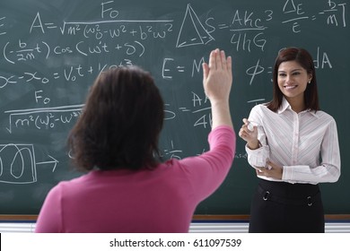 Adult Student Raising Hand Teacher Stock Photo 611097539 | Shutterstock