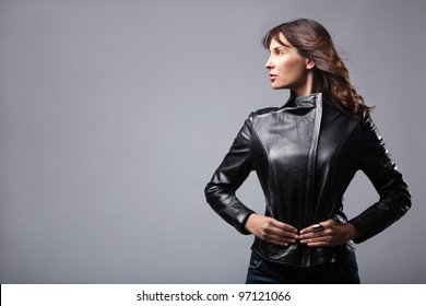 Adult Woman In Black Leather Jacket, Studio Shot