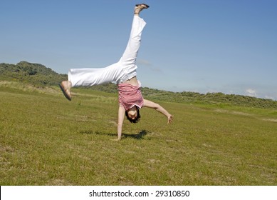 Adult Woman Doing Cartwheel