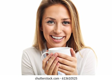 Adult woman drinking cup of tea coffee isolated over white
