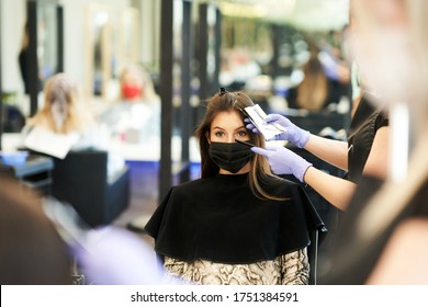 Adult Woman At Hairdresser Wearing Protective Mask Due To Coronavirus Pandemic