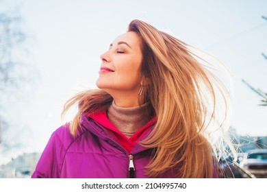 An Adult Woman On The Street Portrait Winter