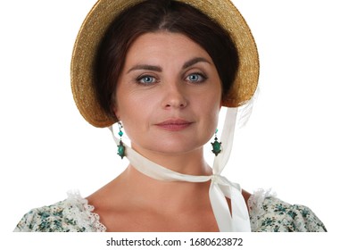 Adult woman in past centuries noble lady look. Attractive girl in straw hat with silk tie around her thin neck. Design work costume designer to create pretty simple gentlewoman look - Shutterstock ID 1680623872