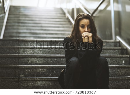 Adult Woman Sitting Look Worried on The Stairway
