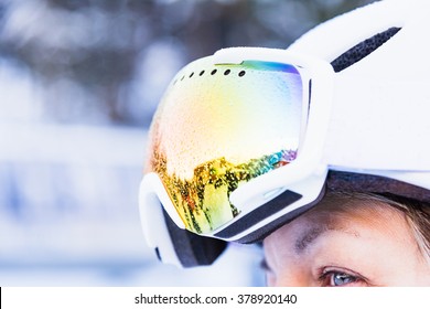 Adult Woman In Ski Glasses Close-up On A Mountain Winter