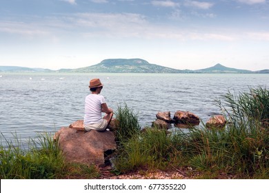 Adult Woman Stays On Lake Balaton In Summer