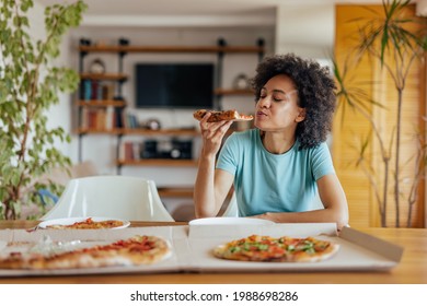 Adult Woman, Taste Testing Her Food And Adding New Ingredients.