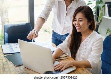 Adult Woman Teaching Her Friend To Stock Trading On Laptop Application. Trade, Stock, Invest Concept.