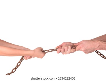 Adults and children's hands pulling an iron rusty chain like a rope in different directions as in a dispute - Powered by Shutterstock