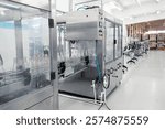 Advanced bottling machine operates in a modern beverage manufacturing facility during daylight hours