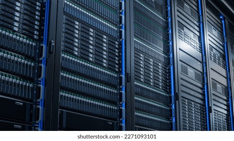 Advanced Cloud Computing Concept. Corridor with Server Racks and Cabinets inside Large Data Center