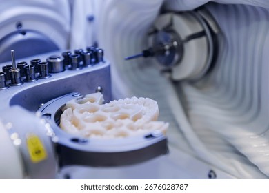 Advanced cnc machine creating precision dental prosthesis for perfect oral health.