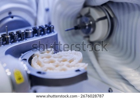 Advanced cnc machine creating precision dental prosthesis for perfect oral health.