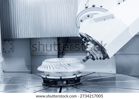 Advanced cnc milling machine operating in industrial manufacturing setting.