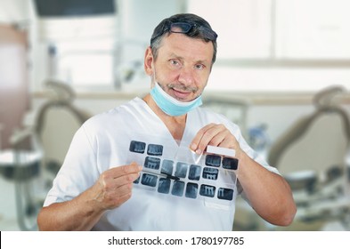 Advanced Oral Health Insights: Skilled Dental Professional Leverages X-ray Technology for Comprehensive Patient Care. - Powered by Shutterstock