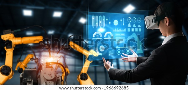 Advanced robot arm system for digital industry and\
factory robotic technology . Automation manufacturing robot\
controlled by industry engineering using IOT software connected to\
internet network .