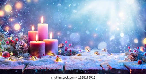 Advent - Four Purple Candles With Christmas Ornament In Shiny Night
 - Powered by Shutterstock