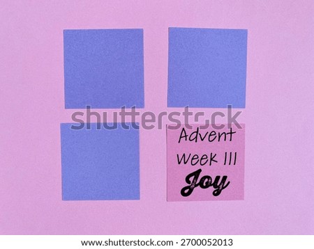 Advent week 3 joy text on pink color paper with copy space background. Advent third sunday concept.