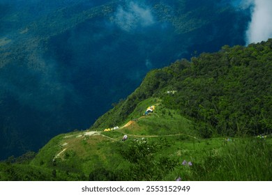 Adventure expedition mountain range camping setup lush green environment aerial view nature exploration - Powered by Shutterstock