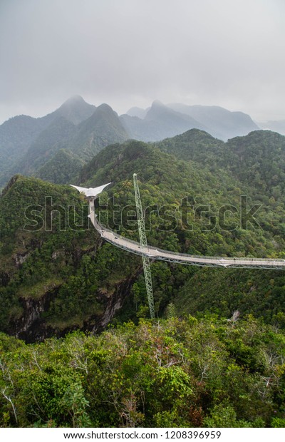 Adventure holiday travel\
Malaysia(Asia) concept. Scenic landscape view of symbol/landmark of\
Langkawi Island - Sky Bridge and cable car on Mat Cincang mountain.\
Tourist popular\
attraction/destination.