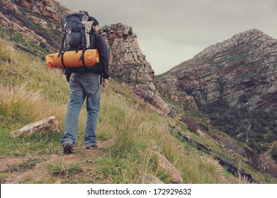 Adventure Man Hiking Wilderness Mountain With Backpack, Outdoor Lifestyle Survival Vacation