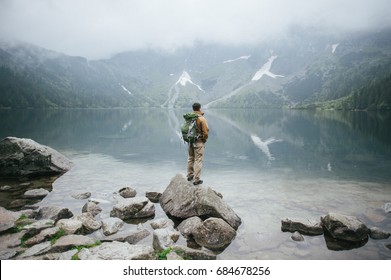 Adventure Man Hiking Wilderness Mountain With Backpack, Outdoor Lifestyle Survival Vacation