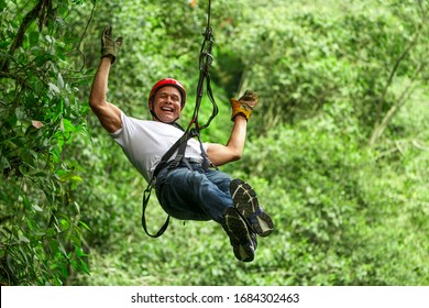 Adventure Zip Line Zipline Sport Man Forest Tree People Adrenaline Men Grown Male On Zipline Ecuadorian Andes Adventure Zip Line Zipline Sport Man Forest Tree People Adrenaline Men Tour Courage Fast R