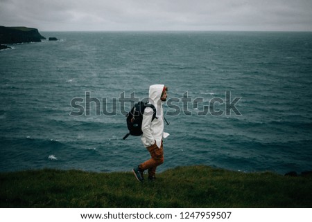 Similar – Foto Bild Cliffs of Moher, Frau schaut in die Ferne