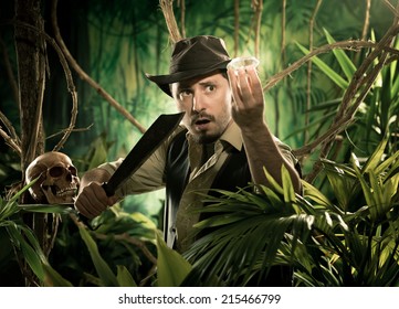 Adventurer with machete finding a huge gem in the jungle with skull on foreground.