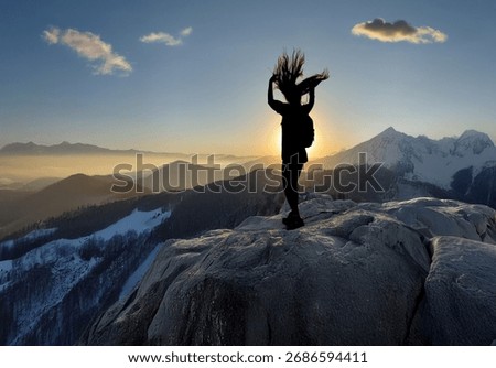 Adventurous female model exploring cinematically scenic areas with her hair blowing in the wind